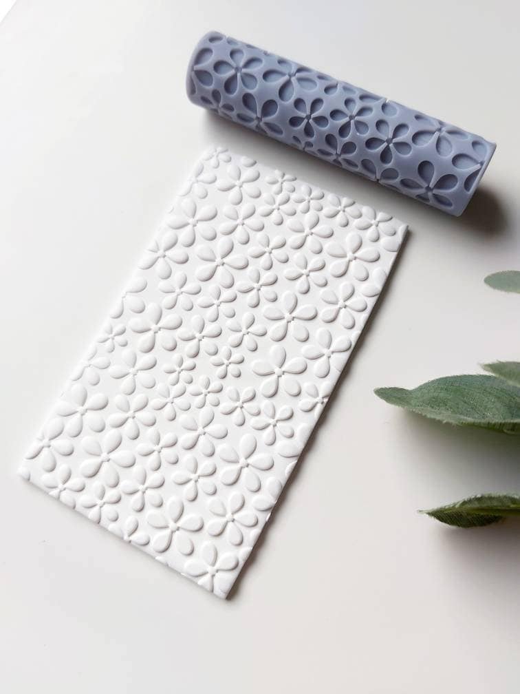 Rouleau de texture d'argile marguerite