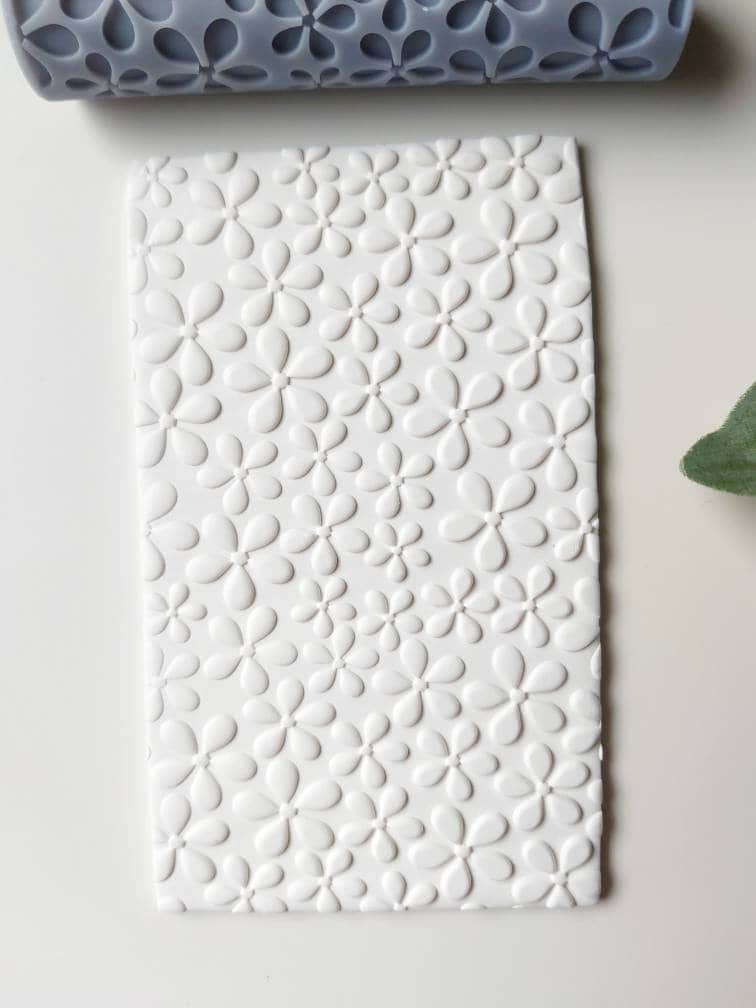 Rouleau de texture d'argile marguerite