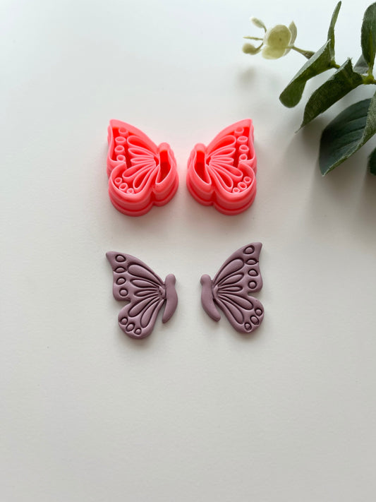 Demi-papillon en relief